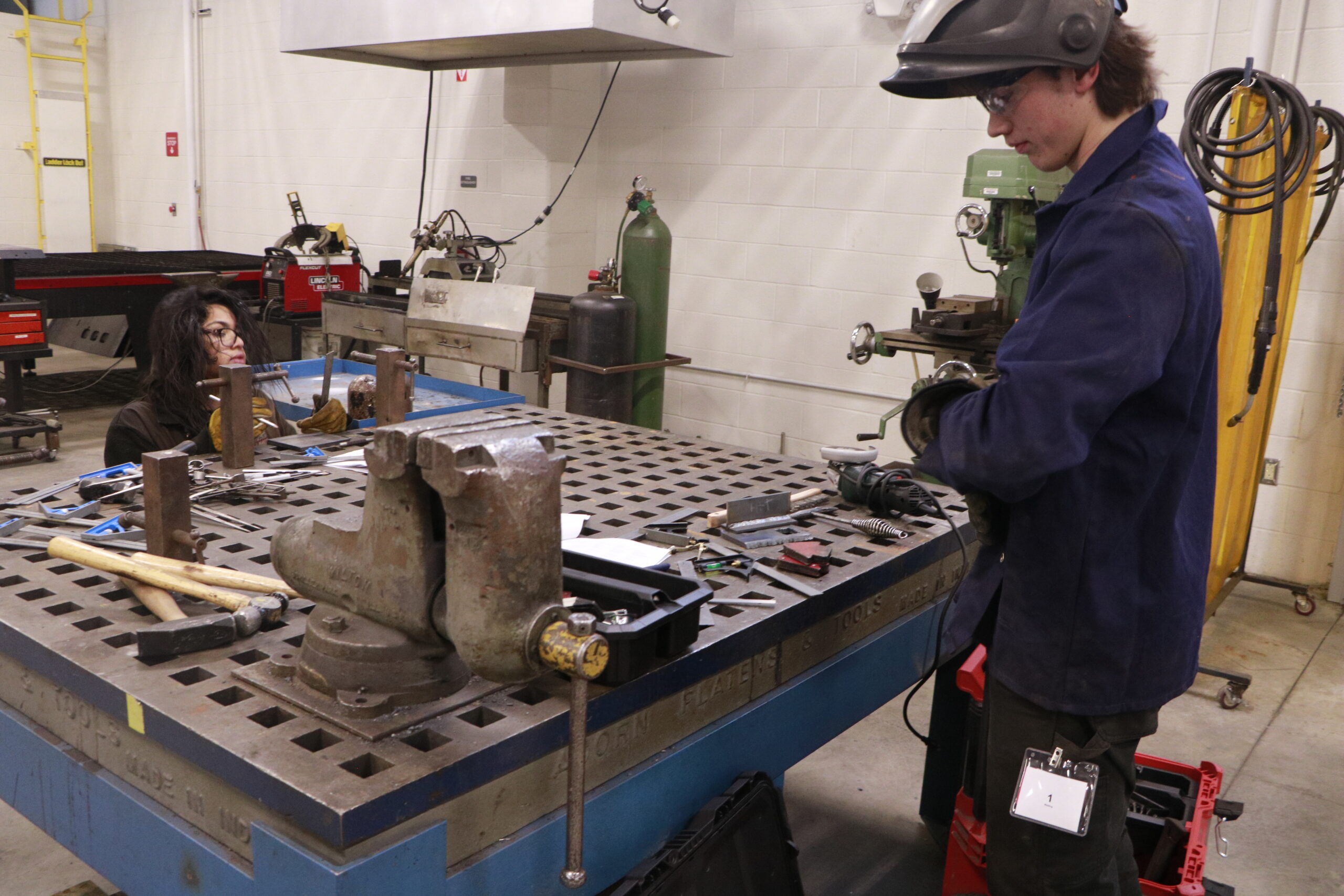 Student using a wrench